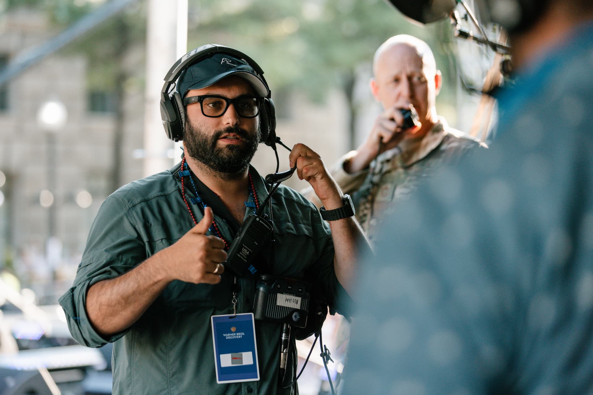 Stagecoach producer on headset during the CNN Fourth in America broadcast