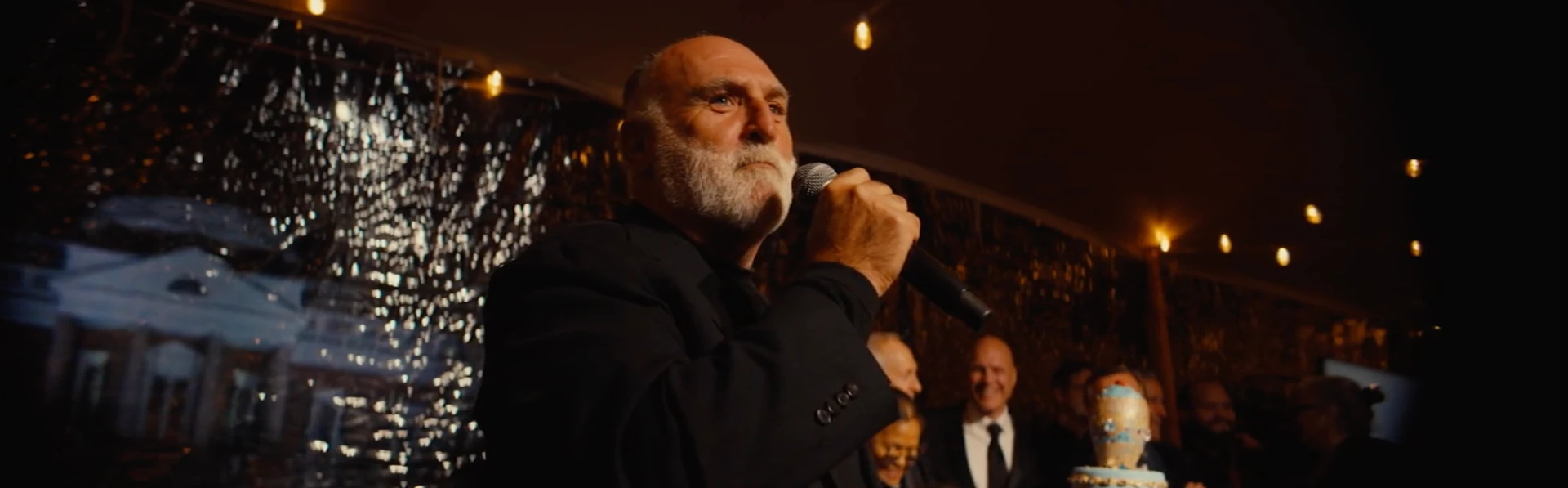 José Andrés speaking on camera at an evening event filmed by Stagecoach