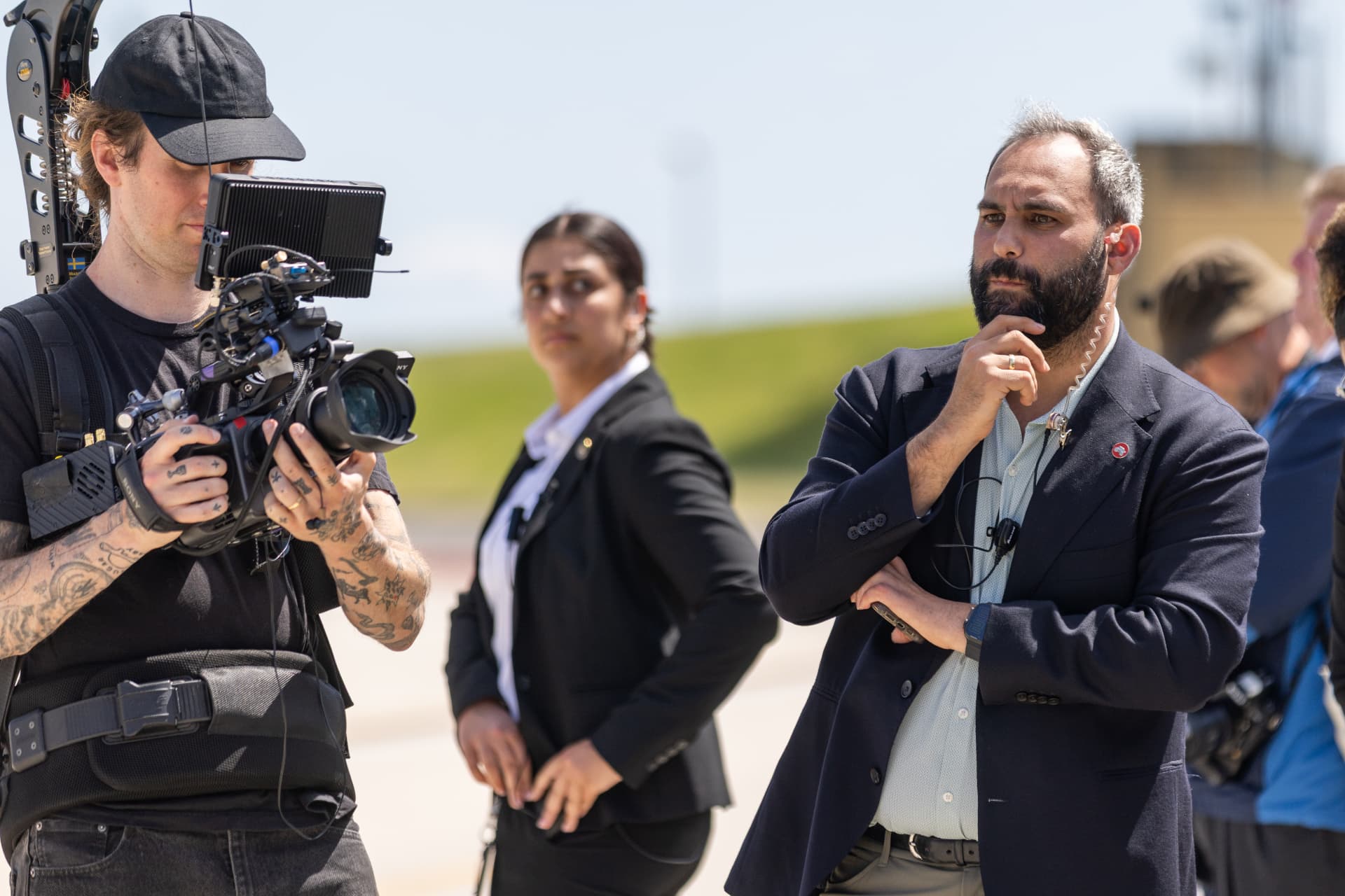 Stagecoach camera operator and producer covering an arrival on the tarmac
