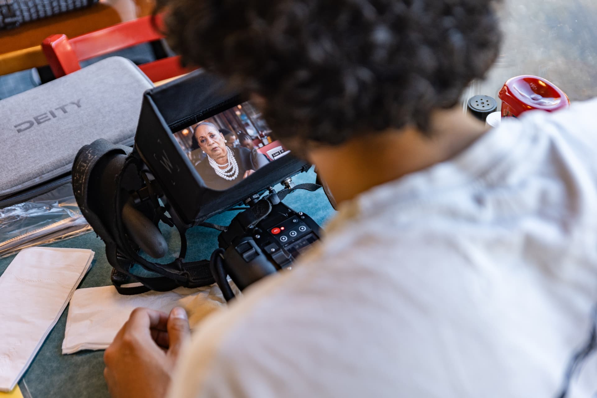 Documentary interview framed on a camera monitor during a Selma shoot