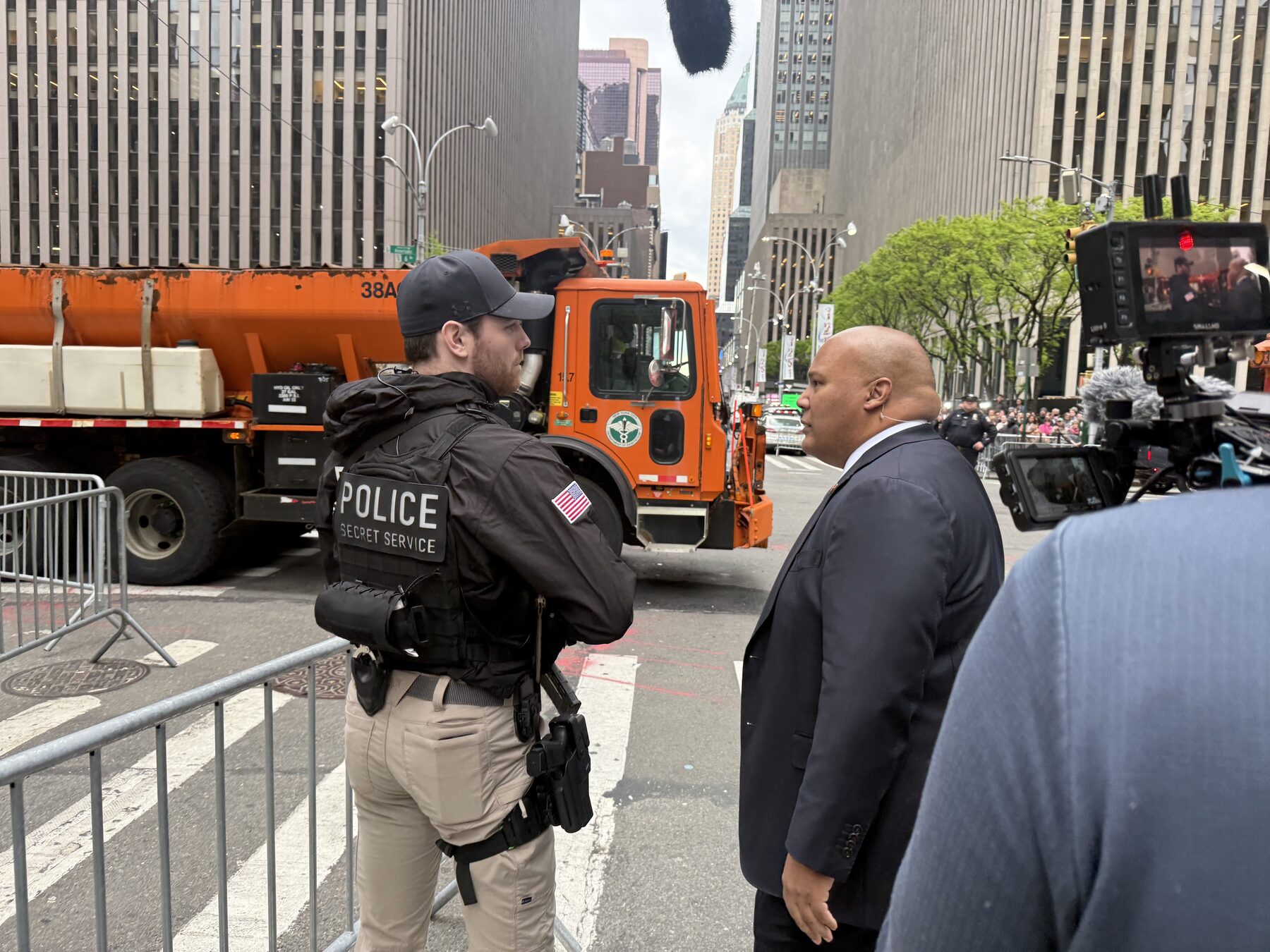 Stagecoach documentary crew filming a subject on a secured New York City street